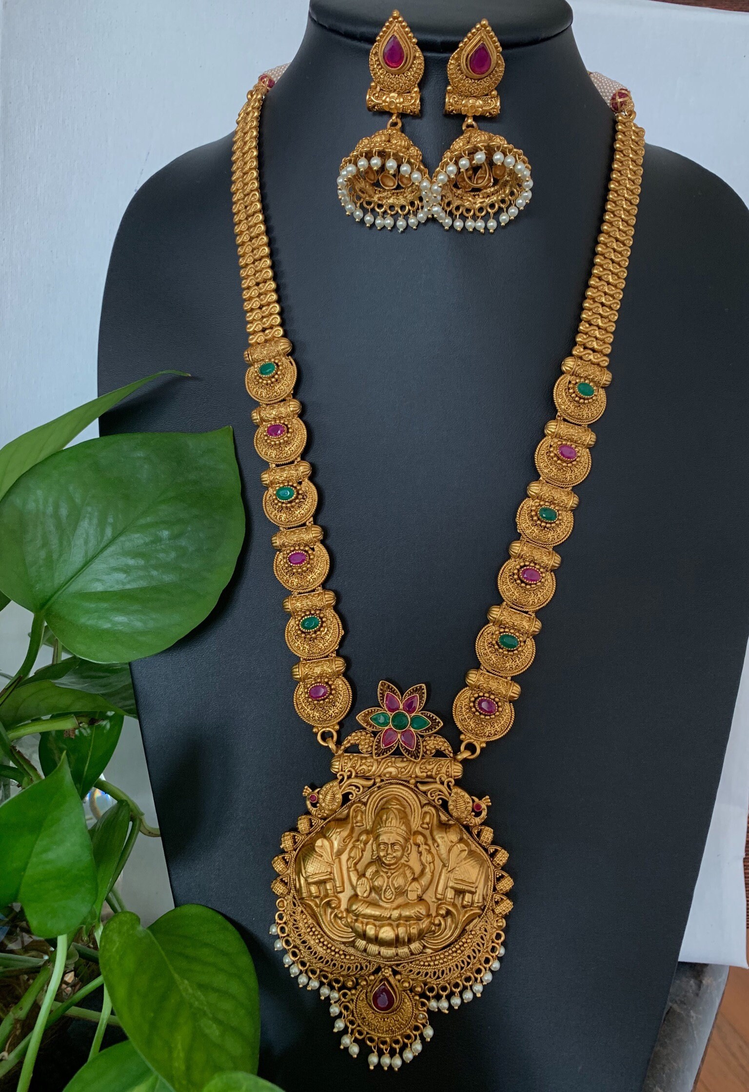 Gold haram designs with lakshmi pendant best sale
