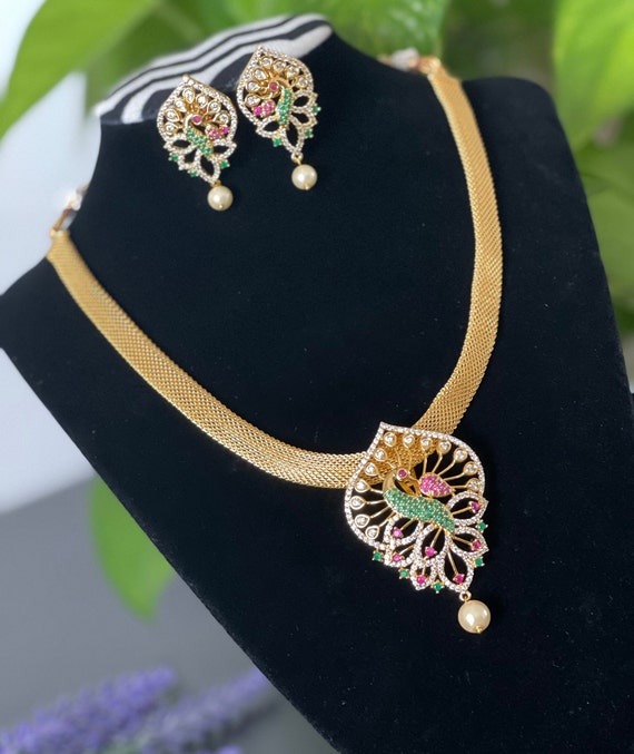 Gold Finished AD CZ Necklace Set With Matching Jhumkas