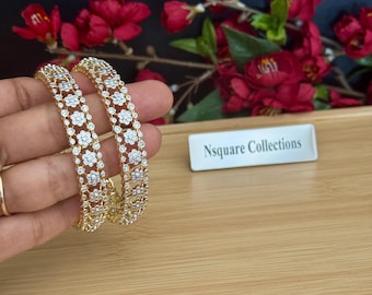 Diamond Bangles / A pair of CZ two tone finished Gold Bangles