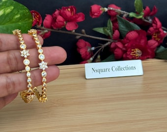 Diamond Bangles / A pair of CZ Gold Bangles