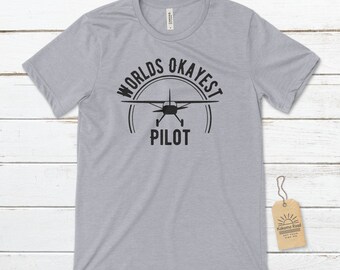 World&#39;s Okayest Pilot Unisex T-Shirt, Funny Pilot T-Shirt, Aviation T-Shirt, Pilot Gift, Airplanes Shirt, New Pilot T-Shirt