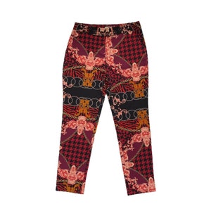 May include: Red, black and gold patterned trousers with a chain link design.