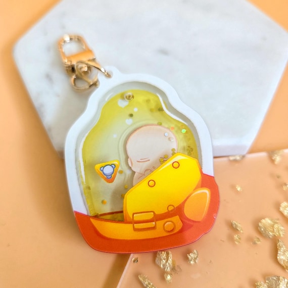 BB Lou Death Stranding Acrylic Liquid Keychain.