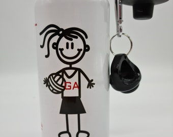 May include: White water bottle with a black lid and a black carabiner clip. The bottle has a black and white illustration of a person playing netball with the letters "GA" on their jersey.