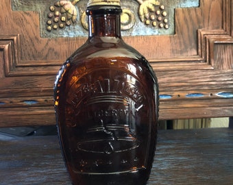 Vintage Embossed Log Cabin Syrup  1776 Liberty Bell Amber Glass Bottle