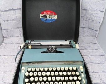 Vintage Blue Smith-Corona Super Sterling Manual Portable Typewriter with Hard Case