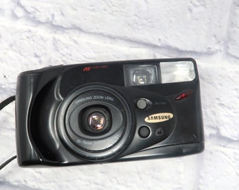 Samsung AF Zoom 777i 35mm film autofocus point and shoot camera with zoom lens g4
