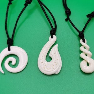 X 1 hand carved yak bone pendant (3 different)