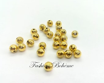 x 20 Perles rondes œil tibétain 6 mm métal doré