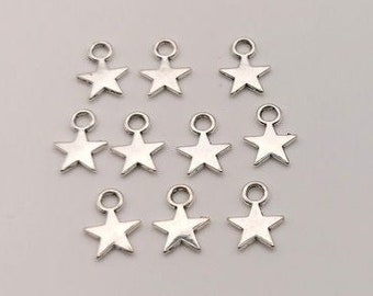 x 10 Silver star charms 10x8x2mm