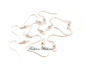 May include: Silver earring hooks with a small ball at the end of the hook. The hooks are designed to be used with jewellery making supplies.