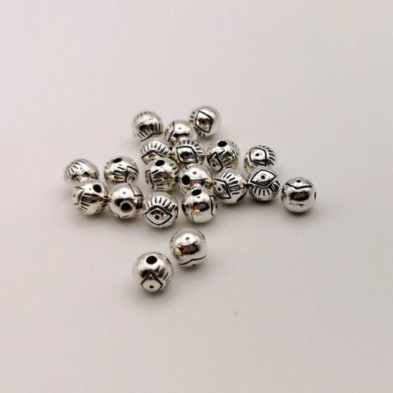 x 20 Perles rondes œil tibétain 6 mm métal argentée image 2