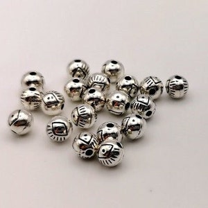 x 20 Perles rondes œil tibétain 6 mm métal argentée image 1