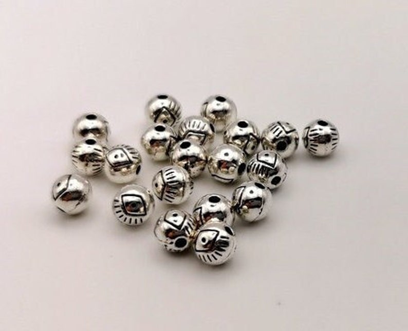 x 20 Perles rondes œil tibétain 6 mm métal argentée image 1