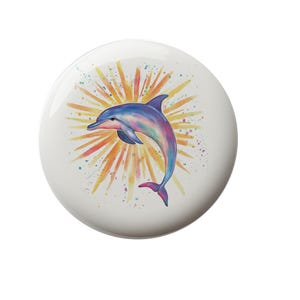 May include: A watercolor painting of a dolphin jumping out of the water with a colorful sunburst behind it.