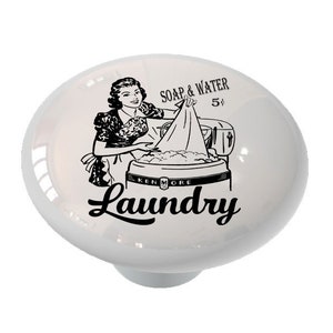 May include: Black and white illustration of a woman doing laundry in a vintage washing machine. The text reads "Soap & Water 5¢ Laundry".