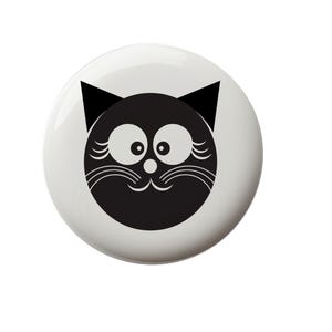 May include: A white button with a black cartoon cat face. The cat has large eyes, a small nose, and a wide smile.