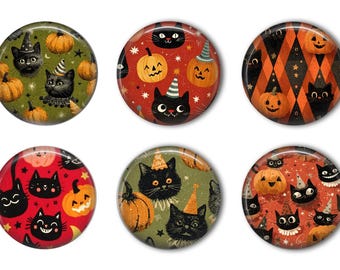 May include: Set of six round Halloween-themed buttons. Each button features a different design with black cats, pumpkins, and festive hats. The backgrounds vary in color, including green, red, and orange, with star and diamond patterns.