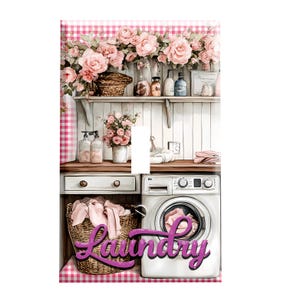 May include: A decorative light switch cover featuring a laundry room scene. The design includes a washing machine, a basket of pink laundry, and a floral arrangement. The word "Laundry" is written in a cursive font.