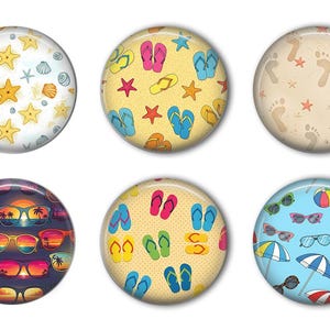 May include: A collection of six round decorative magnets with beach-themed designs. The designs include starfish and seashells, flip-flops, footprints, sunglasses, and beach umbrellas. The color palette features blues, yellows, and oranges.