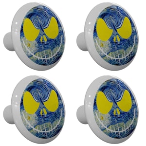 May include: Set of four ceramic cabinet knobs featuring a blue and yellow Jack Skellington inspired design. The design is reminiscent of Vincent van Gogh's Starry Night.
