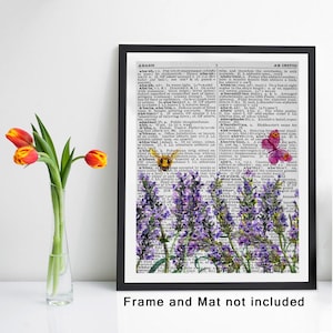 May include: A framed print of a dictionary page with the words "abash" and "ab initio" highlighted. The page is decorated with a watercolor illustration of purple flowers and a bee.