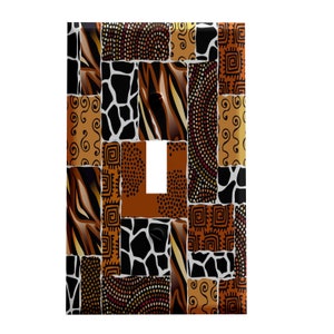 May include: A light switch cover with a patchwork design featuring various animal prints, including giraffe, zebra, and leopard. The cover is made of a durable material and is easy to install.