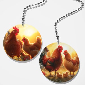 May include: Two round fan pull designs featuring a rooster and hens with chicks. The first design shows a rooster and two hens with a chick in the foreground. The second design shows a rooster and hen with two chicks in the foreground. Both designs have a sunrise in the background.