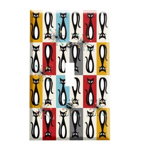 May include: A light switch cover with a repeating pattern of black cats on a colorful background. The colors include red, yellow, blue, and gray.