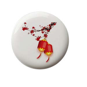 May include: Two red Chinese lanterns with gold trim hang from a branch with pink blossoms. The lanterns are decorated with gold tassels.