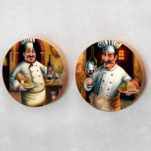 May include: Two round wooden plaques with images of chefs in a kitchen setting. The chef on the left is holding a plate of food and a bottle of wine. The chef on the right is holding a glass of wine and a plate of food. Both chefs are wearing white chef hats and aprons.