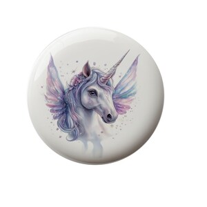 May include: A white unicorn with a purple and pink floral crown and iridescent wings. The unicorn is depicted in a watercolor style with a soft, dreamy background.