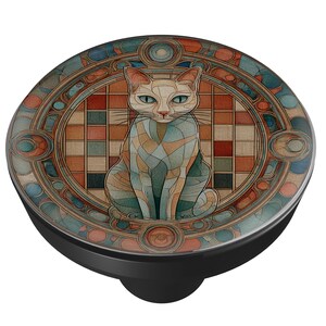 May include: A black phone grip featuring a stylized cat design. The cat is depicted in a stained-glass style with a mosaic background of squares in shades of brown, blue, and green. The border is a circular design with similar colors.