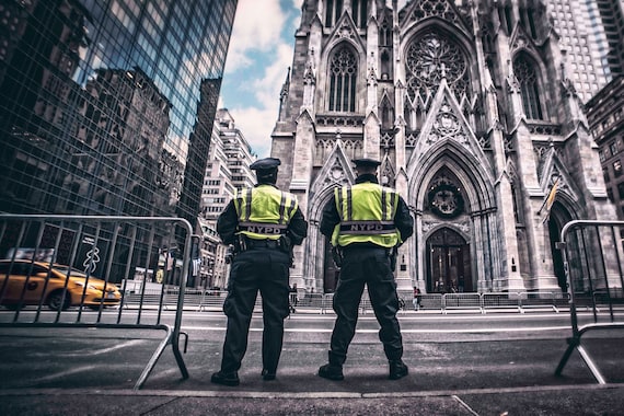 NYPD Cops and Saint Patricks Cathedral Photo Print by Paul Brake