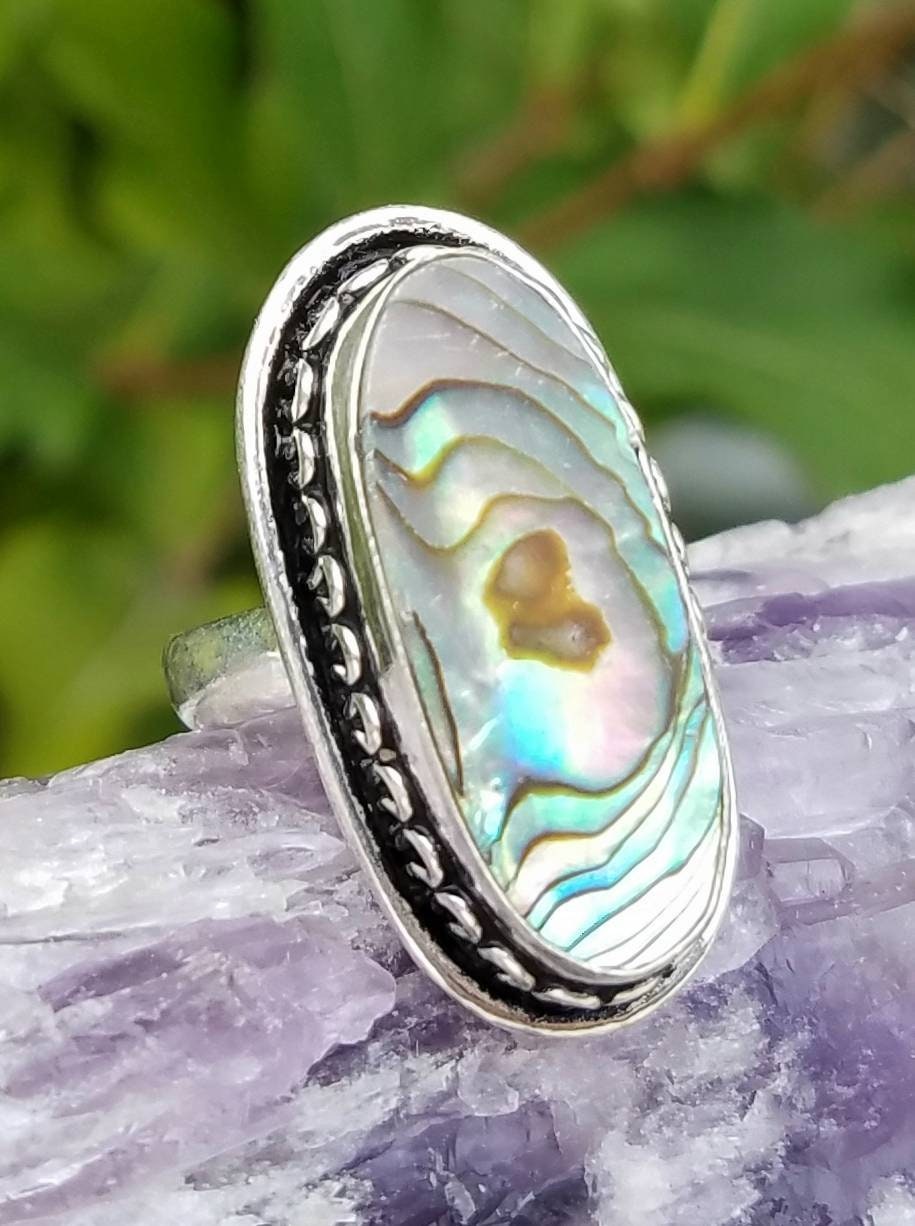 Abalone shell shop ring meaning
