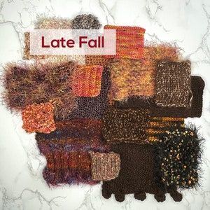 May include: A collection of various knitted and textured fabric swatches in shades of brown, orange, and purple. The text "Late Fall" is displayed on a white rectangle over the swatches. The fabrics have different textures, including fuzzy, ribbed, and patterned designs.