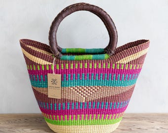 Panier de marché Bolga tissé à la main – Talitah – en marron, vert, turquoise et framboise avec anses en cuir