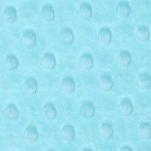 Peut inclure: Un gros plan sur un tissu bleu clair avec un motif textur&eacute; de petits cercles en relief.