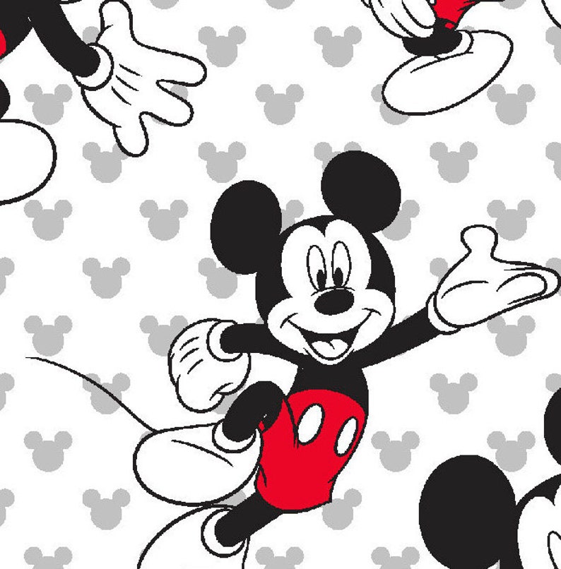 May include: A repeating pattern featuring the iconic Mickey Mouse character. Mickey is depicted in his classic black, white, and red color scheme, with a cheerful expression and outstretched arms. The background is white with gray Mickey Mouse head silhouettes.