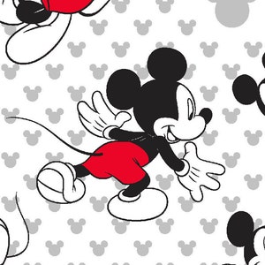 May include: A repeating pattern featuring the iconic Mickey Mouse character in a running pose. Mickey is depicted in his classic colors: black, white, and red. The background is white with a pattern of gray Mickey Mouse head silhouettes.