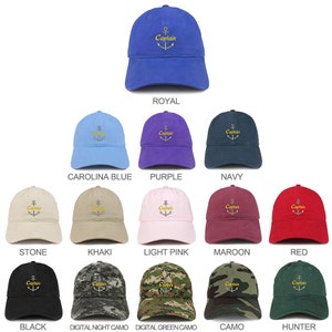 May include: A collection of 12 baseball caps in various colours and patterns. Each cap features an embroidered anchor and the word "Captain" in gold lettering.