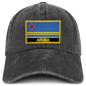 May include: A dark gray baseball cap featuring a patch with the flag of Aruba. The patch includes a blue field with a red star, yellow stripes, and the word "ARUBA" in white text on a black background. The cap is made of a soft, worn material.