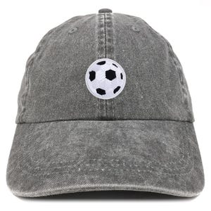 May include: Gray baseball cap with a soccer ball patch. The cap is made of a washed, textured fabric and features a curved brim. The soccer ball patch is white with black pentagons.