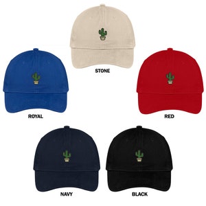 May include: Five baseball caps with a cactus embroidered on the front. The caps are in the colors stone, royal blue, red, navy blue, and black.