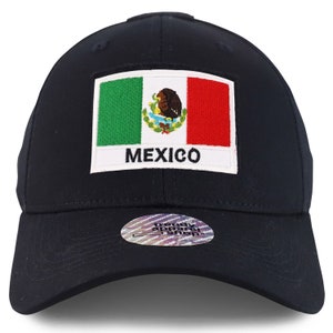 May include: A navy blue baseball cap with a white patch featuring the Mexican flag and the word "MEXICO" embroidered on it.