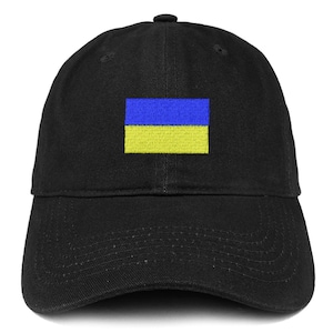 May include: A black baseball cap with an embroidered Ukrainian flag on the front. The flag is yellow and blue.