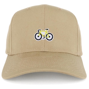 May include: A beige baseball cap with a curved peak. The cap has a small embroidered yellow bicycle with black and white detailing on the front. The hat is made of a soft, durable fabric.