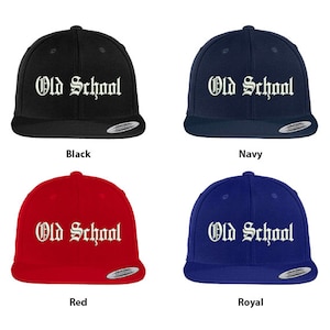 May include: Four baseball caps in different colors: black, navy, red, and royal blue. Each cap features the text "Old School" in white, embroidered in a gothic font.