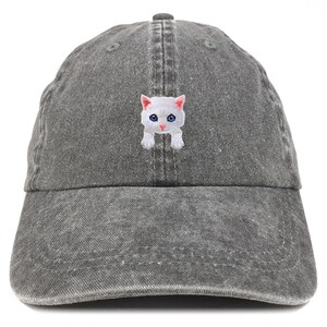 May include: A gray denim baseball cap with a white cat embroidered on the front. The cat has blue eyes and pink nose.