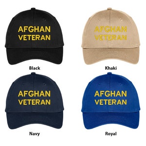 May include: Four baseball caps in different colors: black, khaki, navy, and royal blue. Each cap has the text "AFGHAN VETERAN" embroidered in yellow on the front.